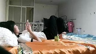 Cute amateur asian web cam girl playing with her toy