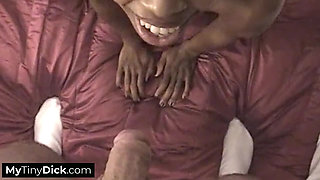 A sexy black babe getting her first tiny white cock