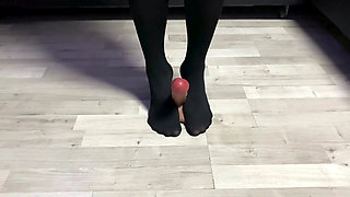 Sexy Dominatrix in Nylon Pantyhose Is Trampling Your Cock