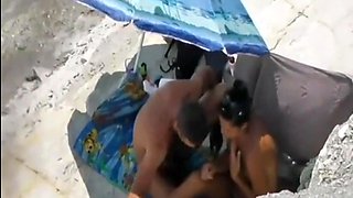Peeking at stepdaughter and BF on beach