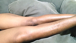 A Woman with Lots of Beautiful Pubic Hair Between Her Legs Lies on Her Sofa Waiting to Be Made Love to Her