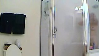 MILF stepmother spied in the shower