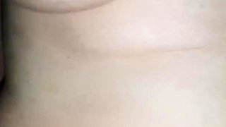 I rub her nipples and clitoris while she rides me