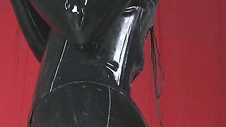 Rubber Catsuit Mistress Says: Lock It up