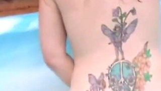 Redhead Amateur MILF with Hairy Pussy Masturbates with a Dildo in the Pool