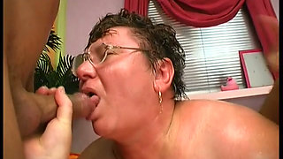 Granny gets jizz on her glasses