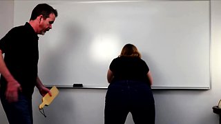 Bondaged redhead getting spanked