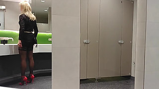 As a Sissi slut at Munich Airport on the road in full travel traffic