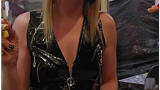 Latex dress, cigarette, and a teasing mood