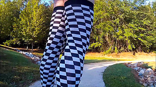 Crossdresser Walking in a public park in high heels