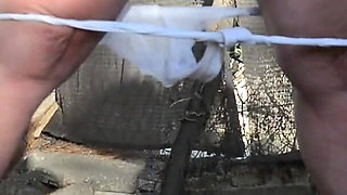 Pissing White Knickers Outside in Bondage