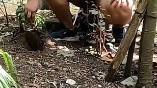 Nudist Planting Trees on Global Nude Gardening Day. Taking Shower Outdoor After Planting Trees.
