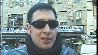 Hot dominatrix in leather with a great body puts a guy in clamps