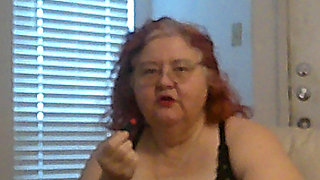 Mature BBW Redhead Nurse Vicki Talks to You as She Makes a Lipstick Applying Video for You!