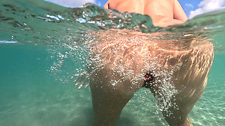 Naked MILF Swimming with Anal Plug Underwater