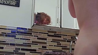 Amateur redhead Jacqueline with glasses masturbates