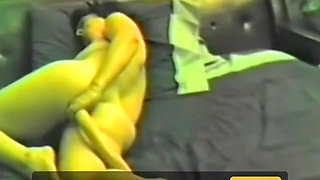 A horny brunette jerking off with two dildos