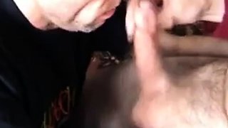 Older man gives an amazing blowjob to a big cock