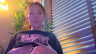 asian mistress gives sloppy dildo blowjob while girlfriend is at work