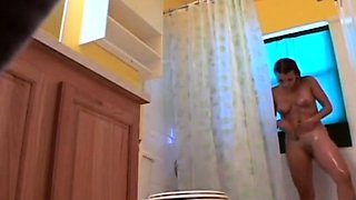 Stepdaughter 21 shaves pussy in shower (voyeur)