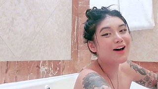 Busty babe playing with her big boobs