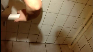 Cute Brunette Blows a Hot Cock on the Toilet
