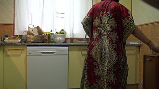 Stepmother lets stepson cum inside her hairy pussy in the kitchen