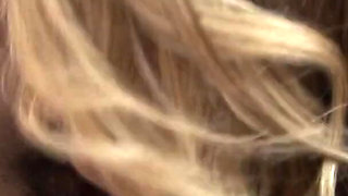 Black teen lies on the couch and enjoys her warm pussy eating