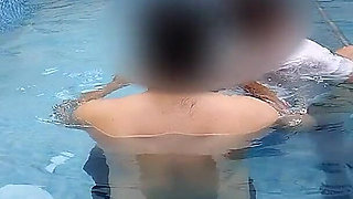 A Hot Couple's Risky Fun in the Swimming Pool.
