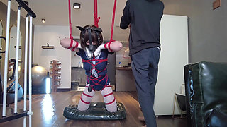 Mz31 - a Girl Tied and Suspended by a Red Rope Reaches Orgasm.