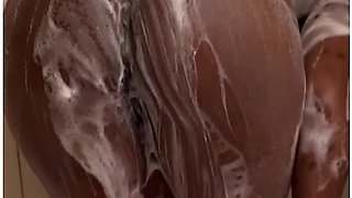 Soapy shower fun with a gorgeous black beauty