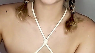 Lola, Wearing a Bondage Outfit, Gives a Perfect Blowjob